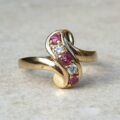 Ruby & Paste Scroll Ring in 9ct Gold.