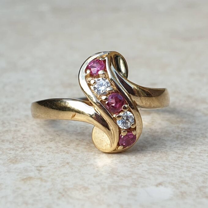 Ruby & Paste Scroll Ring in 9ct Gold.