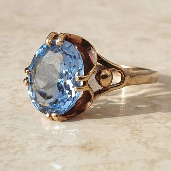 Synthetic Spinel Solitaire Ring in 9ct gold,  a UK L 1/2-M or a US 6 1/2.