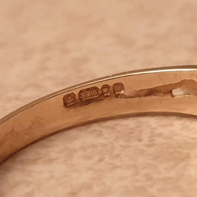 Seven Stone Garnet Band in 9ct Gold, a UK L 1/2 or a US 6