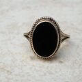 Oval Onyx Solitaire Ring in 9ct Gold,  a UK O or a US 7 1/4.