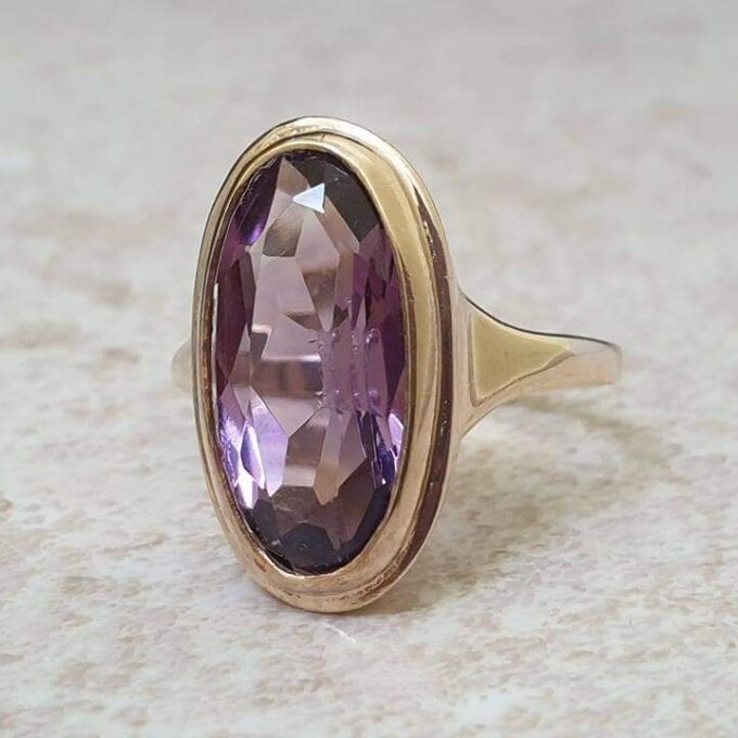 Elongated Oval Amethyst Solitaire Ring in 9ct gold.
