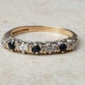 Sapphire & CZ Half Eternity Ring in 9ct Gold, a UK O or a US 7 1/2.