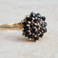 Synthetic Sapphire Cluster Ring in 9ct Gold, a UK M 1/2 or a US 6 3/4.