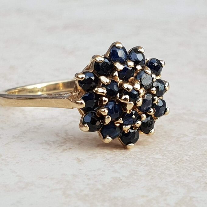 Synthetic Sapphire Cluster Ring in 9ct Gold, a UK M 1/2 or a US 6 3/4.