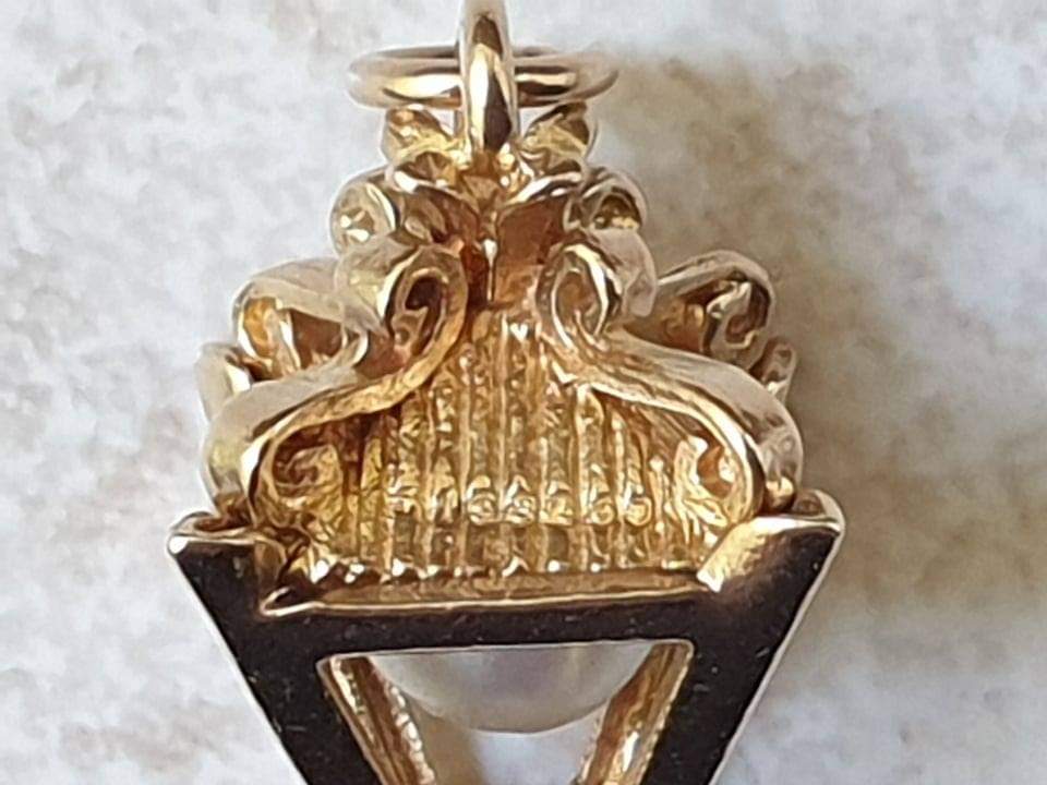 white and gold lantern pendant