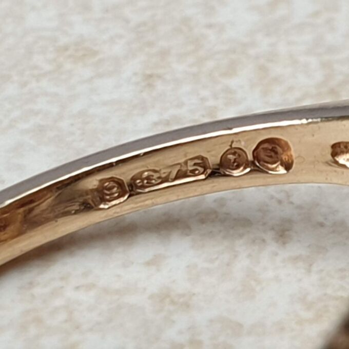 Opal and Garnet Halo Cluster Ring in 9ct Gold.