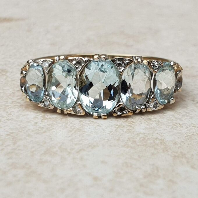 Beautiful Five Stone Aquamarine Ring in 9ct Gold, a UK O or a US 7 1/2.