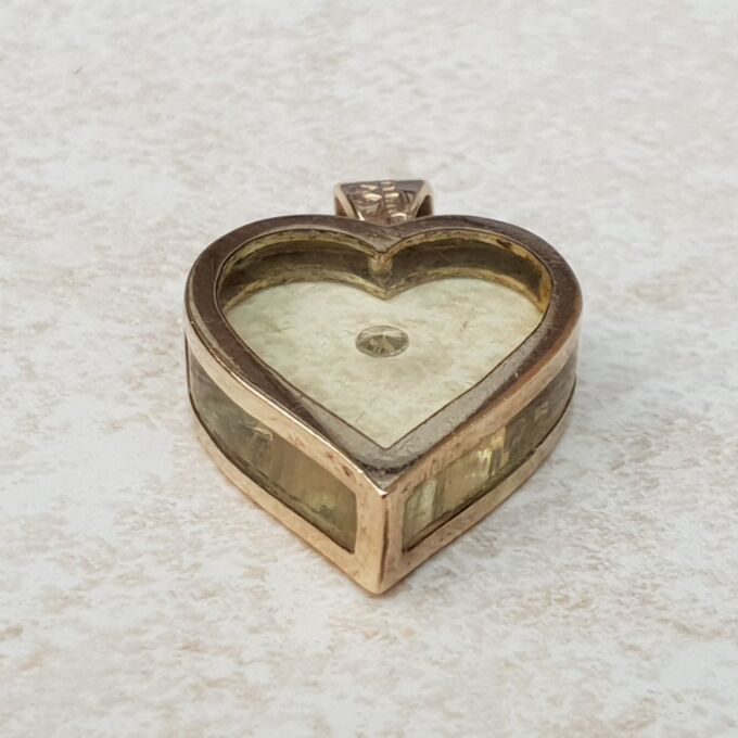 Delightful Floating Diamond Heart Pendant in 9ct Gold