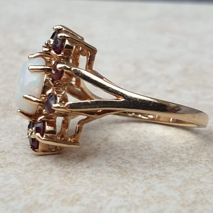 Opal and Garnet Halo Cluster Ring in 9ct Gold.