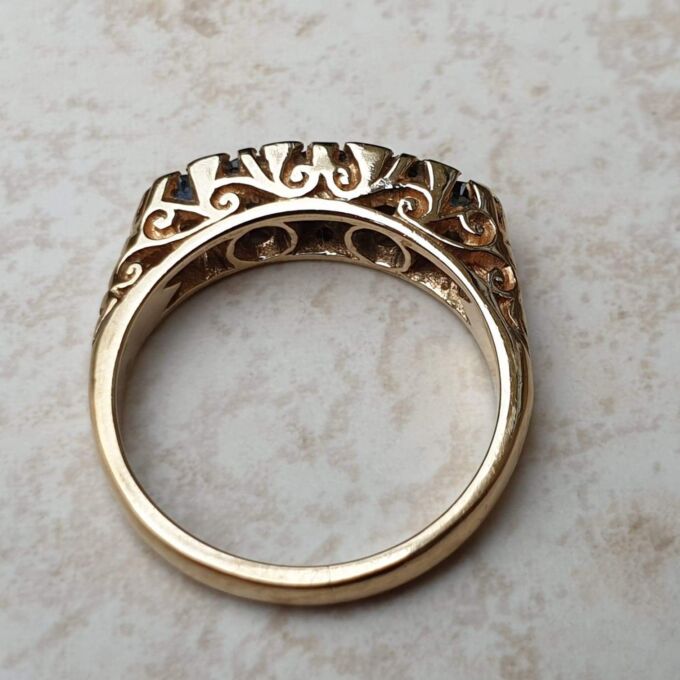 Blue Sapphire Five Stone Ring in 9ct Yellow Gold, a UK K 1/2 or a US 5 3/4.