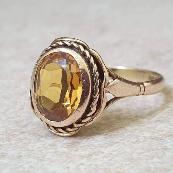 Vibrant Synthetic Yellow Sapphire in 9ct Gold, a UK N or a US 7