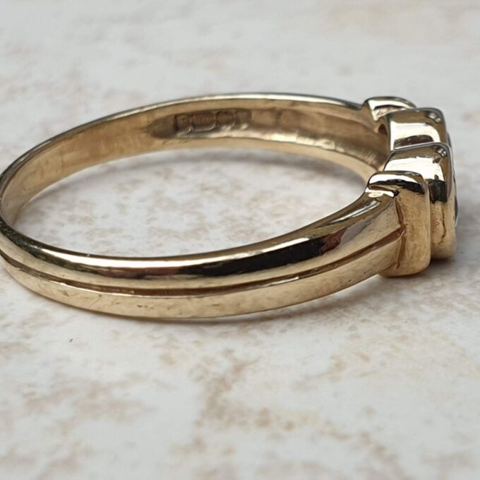 Torque Style Topaz Ring in 9ct Gold,  a UK M or a US 6 1/2.