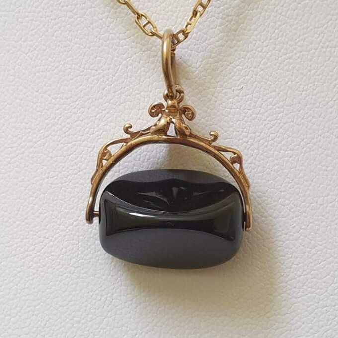 Onyx Spinner Fob Pendant in 9ct Gold.