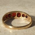 Six Stone Graduating Garnet Band Ring in 9ct Gold, a UK S or a US 9 1/4