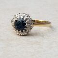 Sapphire and Diamond Halo ring in 18ct Gold and Platinum, a UK M or a US 6 1/2.