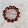 Garnet Twelve Stone Circular Brooch in 9ct Gold