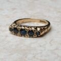 Blue Sapphire Five Stone Ring in 9ct Yellow Gold, a UK K 1/2 or a US 5 3/4.