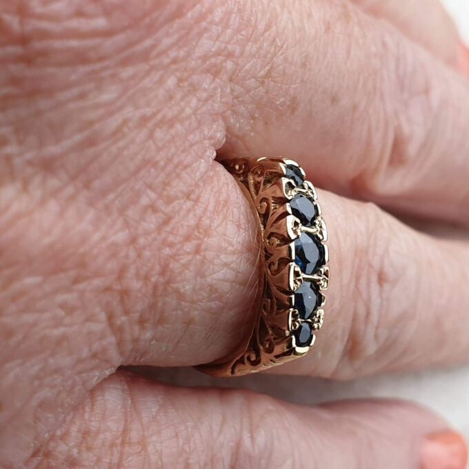 Blue Sapphire Five Stone Ring in 9ct Yellow Gold, a UK K 1/2 or a US 5 3/4.