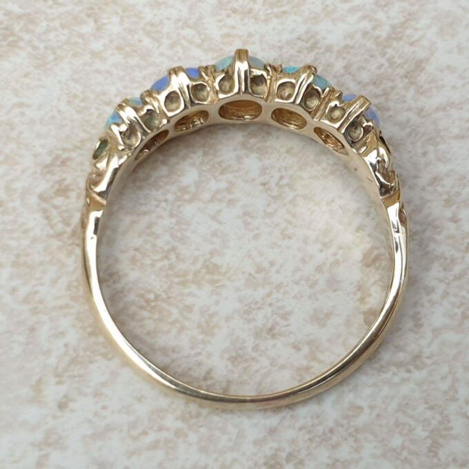 Graduating Five Stone Opal Ring in 9ct Gold,  a UK O or a US 7 3/4.