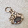 Tiny Garnet Fob Charm in 9ct Gold