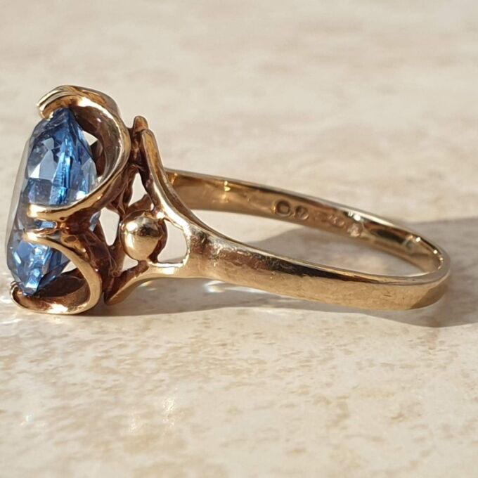 Synthetic Spinel Solitaire Ring in 9ct gold,  a UK L 1/2-M or a US 6 1/2.