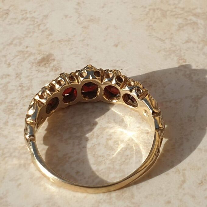 Graduating Five Stone Garnet Ring in 9ct Gold,  a UK N 1/2 or a US almost 7 1/4.