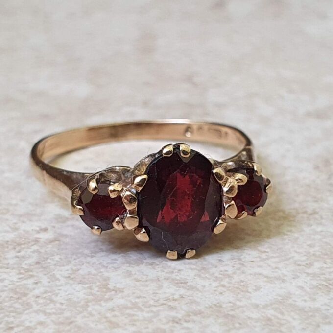 Garnet Trilogy Ring in 9ct Gold.