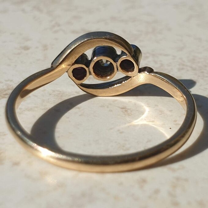 Ruby & Diamond Trilogy Crossover Bypass Ring in 18ct Gold.