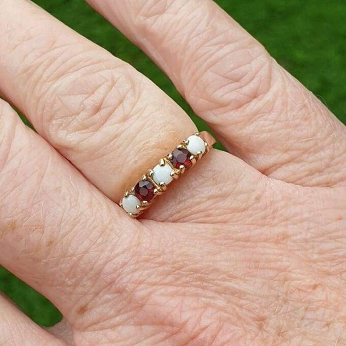 Opal and Garnet Ring in 9ct Gold, a UK J or a US 5