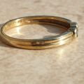 Diamond Set Torque Ring in 9ct Gold,  a UK M 1/2 or a US 6 3/4.