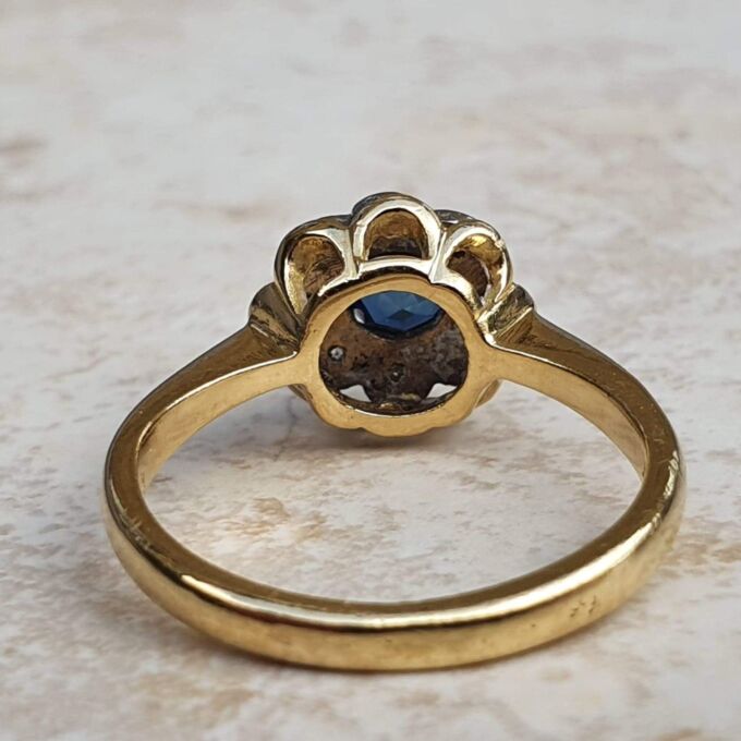 Sapphire and Diamond Daisy Ring in 18ct Gold,  a UK J or a US 5.