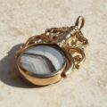 Ornate Double Sided Agate and Onyx Spinner Fob in 9ct Gold.