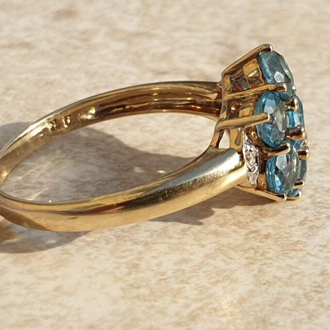Topaz Flower Cluster Ring in 9ct Gold,  a UK O 1/2 or a US 7 3/4.