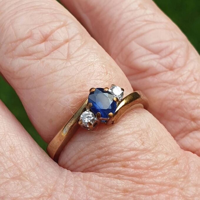 Sapphire and Diamond Trilogy Bypass Ring in 9ct Gold, a UK I 1/2 or a US 4 3/4.