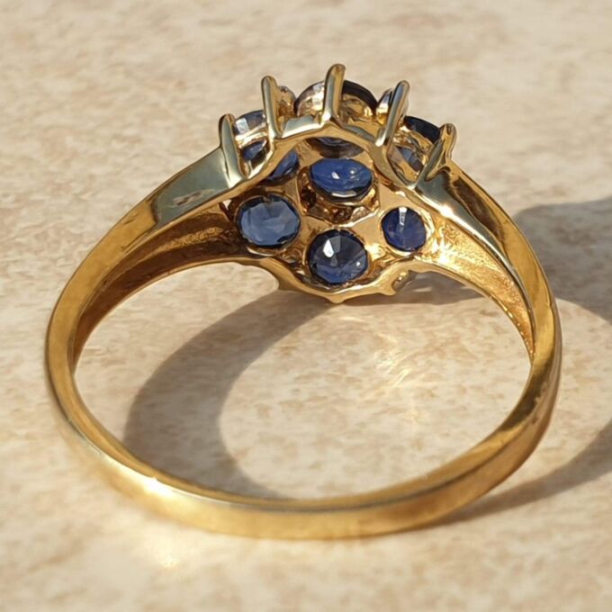 Tanzanite And Diamond Cluster Ring in 9ct Gold,  a UK J 1/2 or a US 5 1/4.