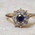 Synthetic Sapphire and Spinel Daisy Ring in 9ct gold, a UK M 1/2 or a US 6 3/4