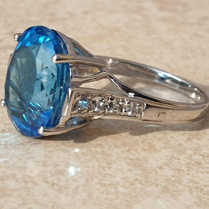 Swiss Blue Topaz Solitaire Ring in 9ct White Gold,  a UK N 1/2 or a US 7 1/4.