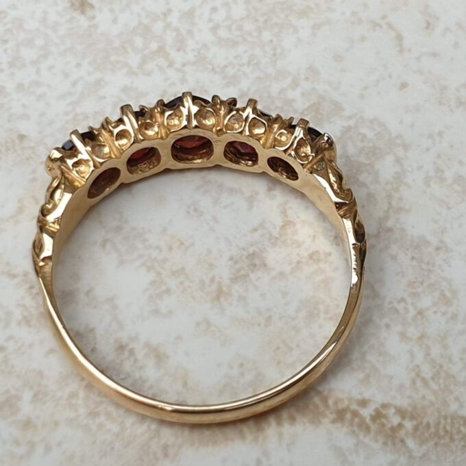 Five Stone Graduating Ring in 9ct Gold,  a UK R or a US 9.