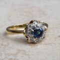 Sapphire and Diamond Daisy Ring in 18ct Gold,  a UK J or a US 5.