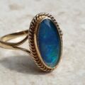 Oval Opal Doublet Ring in 9ct gold, a UK O or a US 7 1/2