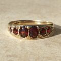 Six Stone Graduating Garnet Band Ring in 9ct Gold, a UK S or a US 9 1/4