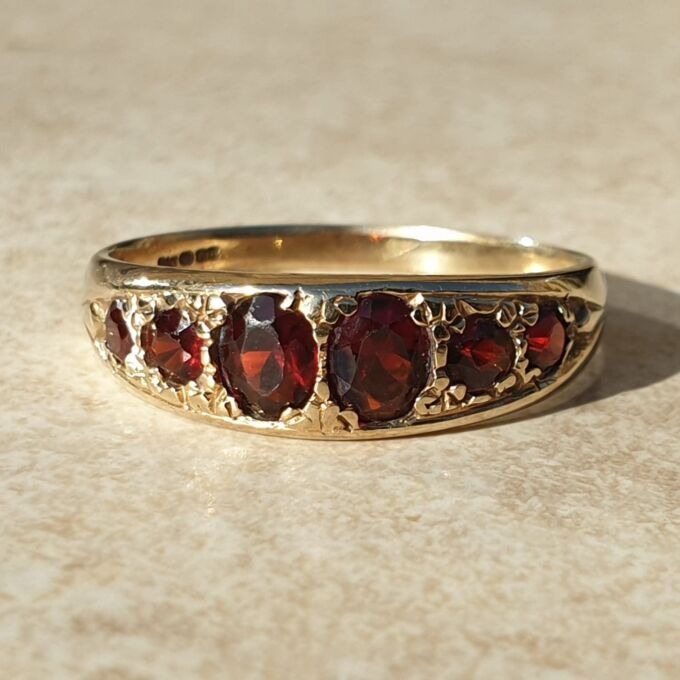 Six Stone Graduating Garnet Band Ring in 9ct Gold, a UK S or a US 9 1/4
