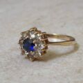 Synthetic Sapphire and Spinel Daisy Ring in 9ct gold, a UK M 1/2 or a US 6 3/4