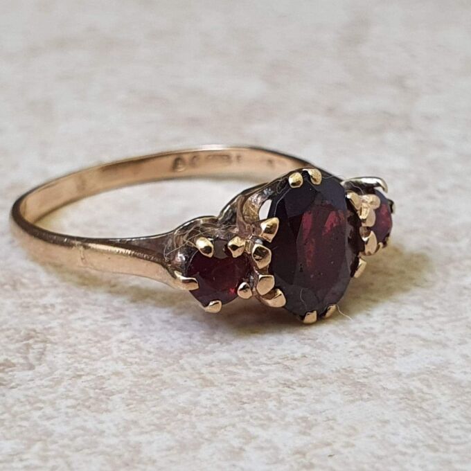 Garnet Trilogy Ring in 9ct Gold.