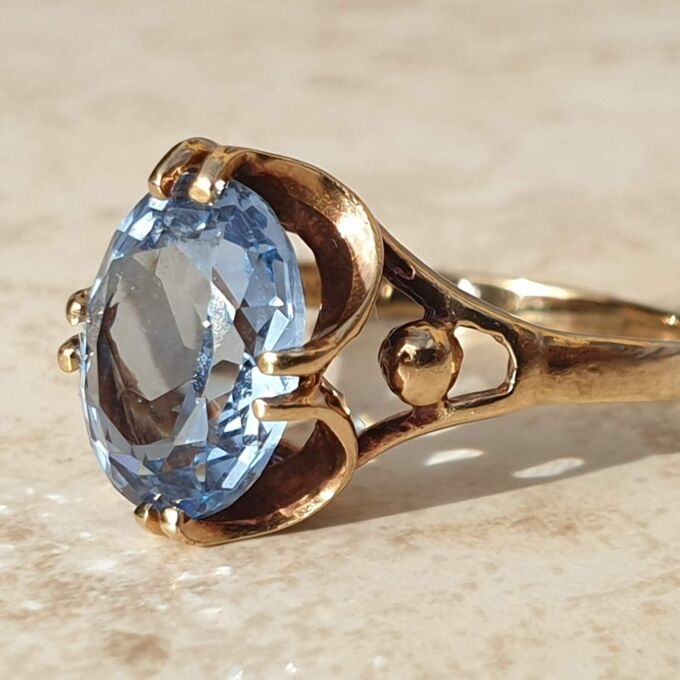 Synthetic Spinel Solitaire Ring in 9ct gold,  a UK L 1/2-M or a US 6 1/2.