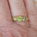 Summery Peridot Three Stone Ring in 9ct Gold, a UK N 1/2 or a US 7 1/4.