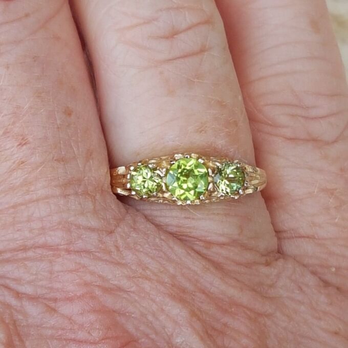 Summery Peridot Three Stone Ring in 9ct Gold, a UK N 1/2 or a US 7 1/4.