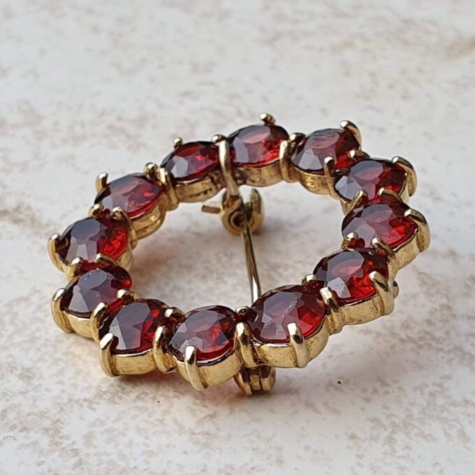 Garnet Twelve Stone Circular Brooch in 9ct Gold