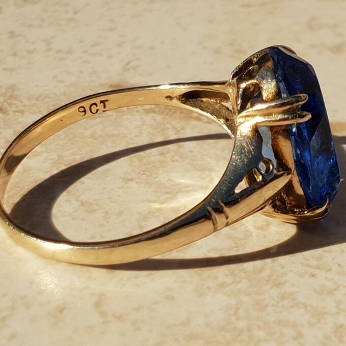 Eye-catching Blue Paste Solitaire in 9ct Gold, a UK P 1/2 or a US 8 1/4.